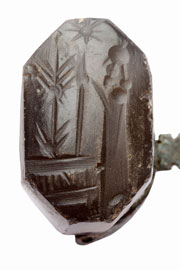 Late Babylonian seal depicting a praying man in front of divine symbols 