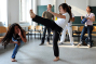 Akrobatisch und feurig: Vertreter des Hochschulsports an der WWU brachten den Studierenden den Tanz Capoeira nher.  Foto upm / Peter Grewer