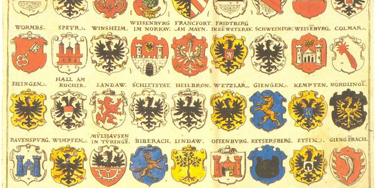Farbige Stich, die eine Übersichtskarte mit Wappen verschiedener Reichsstände des Heiligen Römischen Reichs darstellt. Die Wappen sind unterschiedlichen Farben und Formen und zeigen verschiedene Symbole. Die Karte ist mit Städtenamen wie Köln und Nürnberg beschriftet.