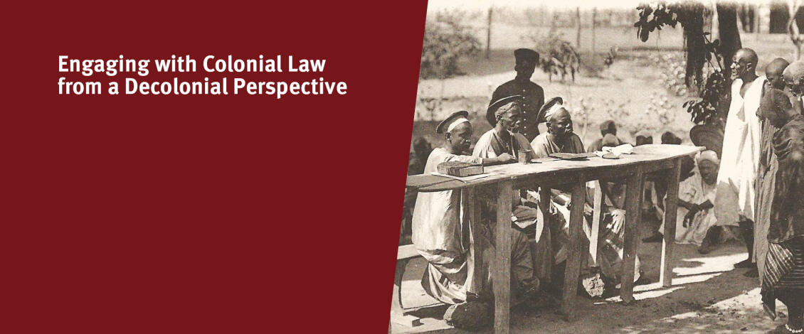 A historical black and white photograph of an indigenous court in Sudan. Several men are seated at a long table, further men stand in front of the table. The scene takes place outdoors, under trees. The title of the photograph reads "Afrique Occidentale - Tribunal Indigène au Soudan." At the bottom of the image, the signature "Collection générale Pierre Fatou, Dakar" is visible.