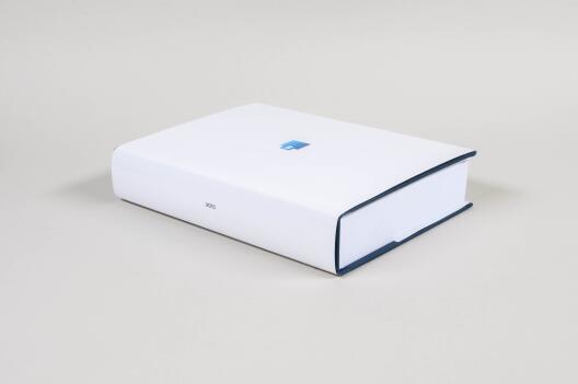 A hardcover book with the icon of the WORD software programme.