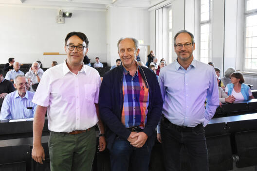 Die Initiatoren der Reihe, Prof. Dr. Matthias Löwe (l.) und Prof. Dr. Martin Hils (r.), begrüßten den Referenten Prof. Dr. Wolfgang Lück von der Universität Bonn.