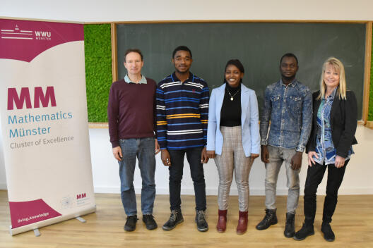 The YAM Fellows 2023/2024, Junior Parfait Ngalamo, Marjory Mwanza and Abakar Assouna Mahamat, with Prof. Dr. Raimar Wulkenhaar (academic coordinator) and Anke Pietsch (programme management assistant).