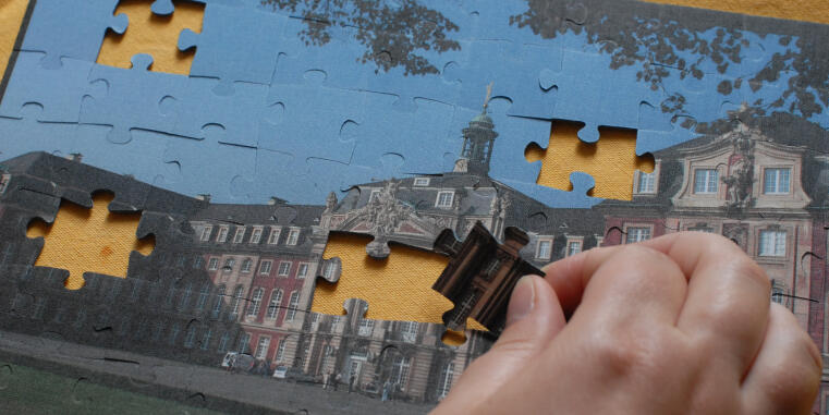 Das Münsteraner Schloss als Puzzlespiel.