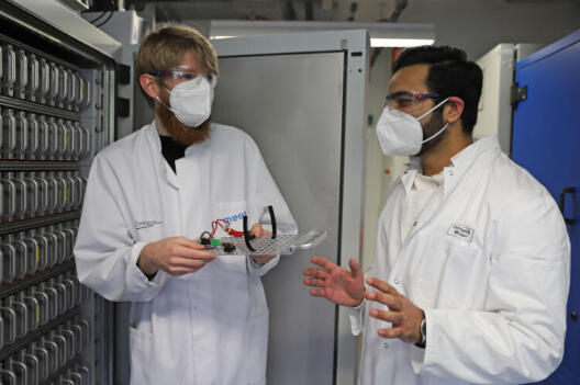 Henry Woolley and Atif Javed in the lab