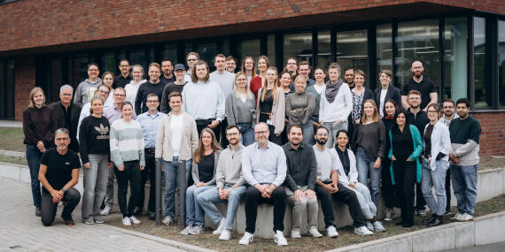 Group photo of the EIMI team
