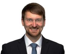 Dr.  Christian Kroll