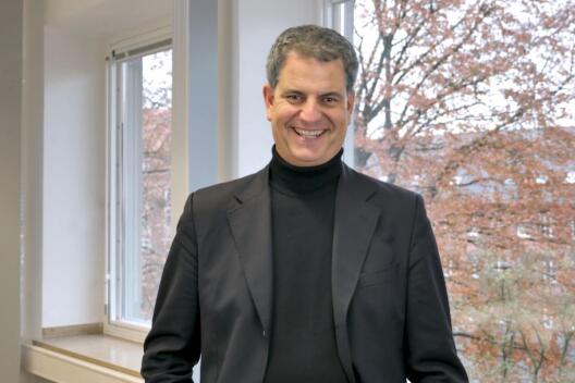 Portrait of Dr Stephan Völlmicke, he smiles