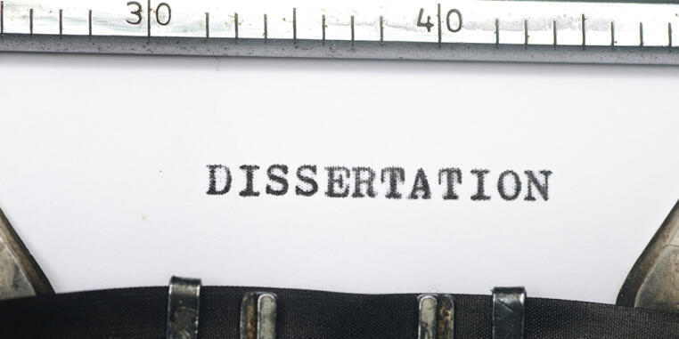 "DISSERTATION" written on a typewriter