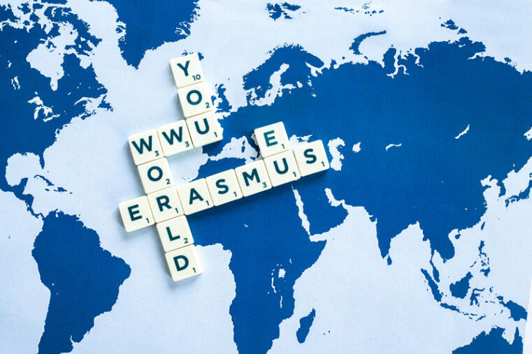 World map with Scrabble letters