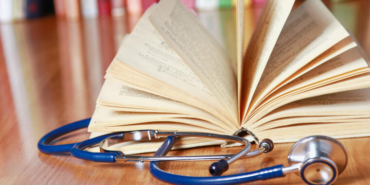 Book with stethoscope