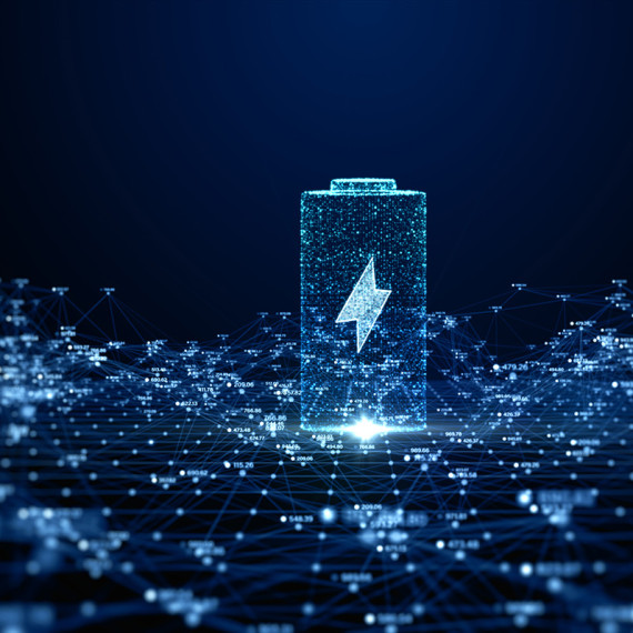 Symbolic image: A futuristic-looking battery with an illuminated outline against a dark background. The lower half of the image is diffusely filled with an illuminated network.<address>&copy; KanawatTH - stock.adobe.com</address>