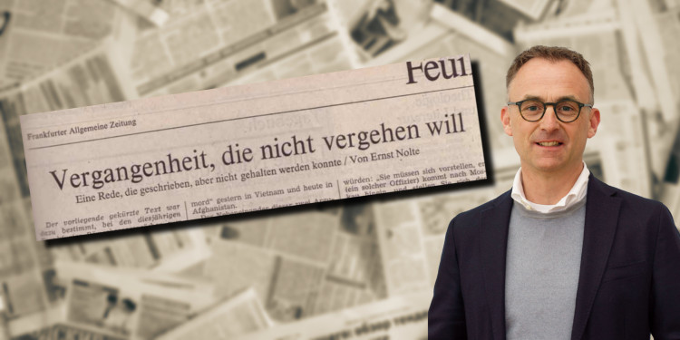 Auf dem Foto sind der Titel des Gastbeitrags und Holger Thünemann zu sehen.<address>&copy; Uni MS - Kalle Kröger</address>