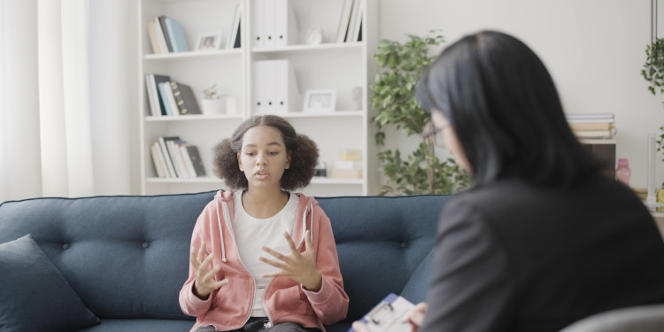 The symbol image shows a child in a psychotherapy situation.<address>&copy; stock.adobe.com – Synthex</address>